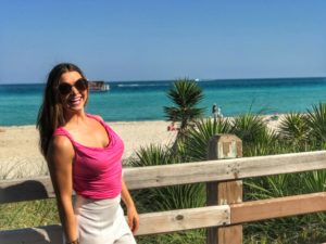 woman smiling next to South Beach
