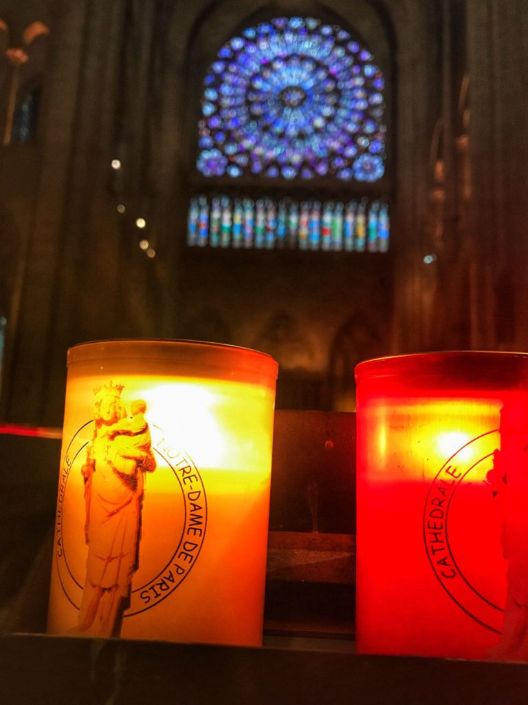 candles burning in Notre Dame