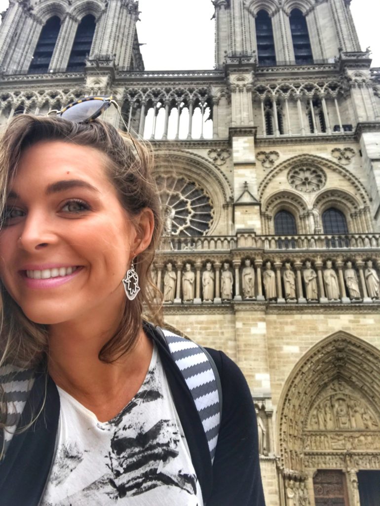woman smiling at Notre Dame